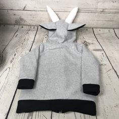 "Fleece Goat Toddler Sweatshirt This is a fleece goat hooded sweatshirt made from 100% polyester fleece. Features: -Lined hood with ears, eyes, nose, and stuffed horns -Pockets on front with felt footprint details -Cuffs and bottom band Shown is a size 2/3T on a mannequin measuring 38\" tall This goat hoodie is available in sizes 2/3T-5/6T and others upon request. Perfect gift for an animal lover! Care: Machine wash cool, gentle Tumble dry low" Toddler Hoodie, Holiday Items, An Animal, Cool Costumes, Fleece Hoodie, Hooded Sweatshirt, Kids Hoodie, Goats, Animal Lover