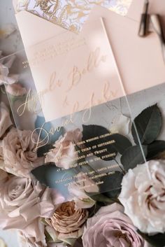 wedding stationery with pink roses and gold foil