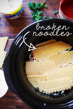 crocked noodles in a slow cooker with parmesan cheese