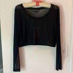 Long Sleeve Sheer Top With Elastic Bottom. Tags On, Never Worn. Fits More Like Medium/Large. I’m Size 14 And It Was Too Tight. Probably More Like 10/12 Black Cropped Mesh Top With Mesh Sleeves, Black Mesh Sleeves Crop Top For Spring, Chic Black Crop Top With Sheer Sleeves, Black Nylon Mesh Top With Long Sleeves, Casual Sheer Mesh Crop Top, Black Nylon Long Sleeve Mesh Top, Trendy Black Sheer Crop Top, Black Sheer Stretch Crop Top, Black Crop Top With Sheer Sleeves For Fall