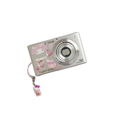 a digital camera with a hello kitty keychain attached to it's front