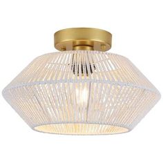 an image of a ceiling light with white wickers on the bottom and gold trim