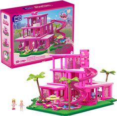 the pink house is in its box and it's next to another toy set