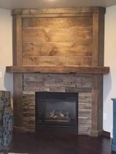 a living room with a fire place and a tv on the wall next to it