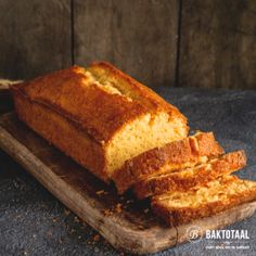 a loaf of bread sitting on top of a cutting board