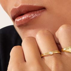 Simple, no-fuss, and versatile, the 14k Solid Gold Stacker Ring adds a drop of sunshine and spark to your summer outfit. Modern Stackable Rings With Bezel Setting, 14k Gold Stackable Solitaire Rings, Minimalist Stackable 14k Gold Rings, Timeless 14k Gold Stackable Midi Rings, White Gold Stackable Rings With Smooth Bezel, Minimalist Yellow Gold Rings With Shiny Finish, Timeless Stackable 14k Gold Rings, Tarnish Resistant, Minimalist Gold-plated Stackable Midi Rings, Stacker Rings