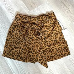 Brand New With Tags! Leopard Animal Print Shorts Size Xs 100% Polyester Elastic Waist In Back Removable Tie Waist Length 14" Rise 12" Inseam 2.5" Brown Cotton Shorts For Day Out, Trendy Leopard Print Shorts For Spring, Trendy Brown Bottoms For Day Out, Chic Leopard Print Short Bottoms, Chic Leopard Print Shorts, Chic Short Leopard Print Bottoms, Brown Bottoms For Fall Vacation, Trendy Leopard Print Bottoms For Vacation, Trendy High-waisted Leopard Print Shorts