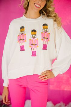 Get ready to crack the fashion code with our PINK SEQUIN NUTCRACKER PULLOVERS. Available in black, navy, or white, these pullovers feature three playful pink sequin nutcracker patches that will add a touch of whimsy to your winter wardrobe. Don't be a nut, grab one now! All orders are currently shipping within 14 business days. To receive item quicker, expedited shipping is available at checkout. **All Christmas orders must be placed with expedited shipping to guarantee delivery by Dec. 24 if pl Last Day To Order, Judith March, Pink Sequin, Christmas Delivery, Nutcracker, Large White, Winter Wardrobe, Last Day, The Fashion