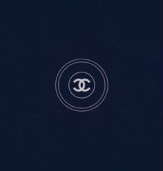 the chanel logo is shown on a dark background