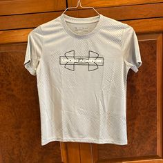 Under Armor Ylg Boys Short Sleeved Silver/Gray Tee, Nwt, Perfect, Never Worn Under Armour Gray Crew Neck Top, Under Armour Shirts, Grey Tee, Under Armor, Boy Shorts, Kids Shirts, Under Armour, Shirts Tops, Tops & Tees