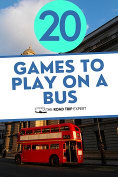 a red double decker bus driving past a sign that says games to play on a bus