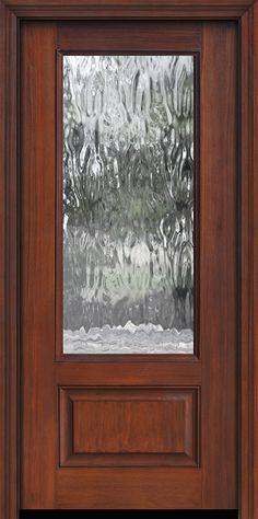 a wooden door with frosted glass on it