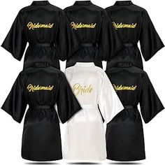 six bridesmaid robes in black and white with gold lettering