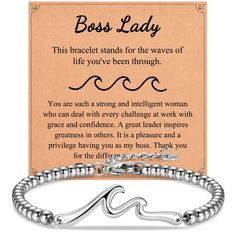 a bracelet with the words boss lady on it and an image of a woman's name