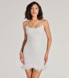 The Adelina sequin mini dress makes an entrance whether you're a bride-to-be or a birthday girlie! The formal party dress is designed with a sleek scoop neckline, a flattering bodycon silhouette, and a fabulous marabou feather trim along the hem. Pair with a rhinestone bracelet.Fit & FeaturesSheer mesh fabric with knit lining, moderate stretchSequin embroidered scroll patternScoop necklineBungee spaghetti straps, back zipper closureMini-length hem with marabou feather trimBodycon silhouetteR Bridal Era, Era Outfits, Orange Homecoming Dresses, Sequin Holiday Dress, Purple Homecoming Dress, Backless Dress Short, Green Homecoming Dresses, White Homecoming Dresses, Lace Dress Styles