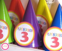 there are many party hats with numbers on them