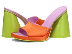 Circus NY Haynes - Women's Shoes : Orange Popsicle Multi : Bring on a vibrant whiff to your look by slipping into the Circus by Sam Edelman Haynes mules. Smooth PU upper with signature metallic logo detail. Synthetic lining with a cushioned foam footbed. Easy slip-on style. Oblique, square toe silhouette. Cone-shaped block heel. Durable rubber outsole. Imported. Measurements: Heel Height: 4 in. Modern Slip-on Synthetic Slides, Modern Synthetic Slip-on Slides, Summer Slip-on Mules With Padded Heel, Modern Slip-on Slides With Padded Heel, Modern Slides With Padded Heel, Summer Party Slip-on Slides, Trendy Synthetic Mules With Padded Heel, Trendy Open Toe Slides With Padded Heel, Retro Spring Mules With Round Toe