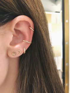 Our simple and classic Gold Mini Huggie Earrings never go out of style. We love the versatility these huggies bring to the table. Need to change your outfit but don't have time to switch up the accessories? We've got you covered. These staple huggies are always in fashion and feature your choice of 14k yellow, rose, or white gold. Diameter of mini huggie: 9.5mm Inner huggie diameter: 6mm Dainty 14k Gold Hypoallergenic Ear Cuff, Dainty 14k Gold Ear Cuff For Everyday, Everyday 14k Gold Ear Climbers, Hypoallergenic Yellow Gold Ear Climbers, 14k Gold Ear Climbers With Ear Wire, Elegant Tiny 14k Gold Huggie Earrings, Fine Jewelry 14k Gold Tarnish Resistant Cartilage Earrings, Tarnish-resistant 14k Gold Cartilage Earrings In Fine Jewelry Style, Tarnish Resistant 14k Gold Cartilage Earrings