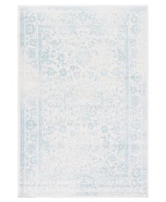 a blue and white rug with an ornate design on the bottom, in front of a white background