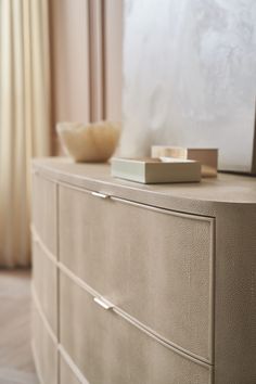 a close up of a dresser in a room