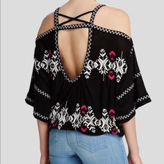 Gorgeous Top! Pretty Embroidery With Open Back Detail. Has Elastic At The Bottom. Hard To Measure Due To Style But Sizing Can Be Flexible Due To The Fit. Casual Black Embroidered V-neck Top, Black Cotton Tops With Motif, Black Summer Blouse With Geometric Embroidery, Black Cotton Tops With Geometric Embroidery, Black Blouse With Geometric Embroidery For Summer, Black Embroidered V-neck Top For Summer, Black Cotton Top With Geometric Embroidery, Black V-neck Embroidered Top For Summer, Black Embroidered Festival Tops