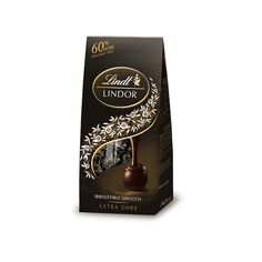 lindil lindor milk chocolate trufle with white flowers on the side