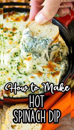 a hand dipping a piece of bread into a hot spinach dip in a cast iron skillet