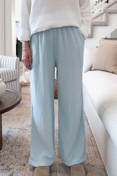 An absolutely effortless pant! The Tulum Cotton Pants in Surf Blue are made in the USA and are both lightweight and comfy. They feature an elastic waistband, side pockets, garment dyed surf blue color, soft cotton gauze fabric and a true to size fit. Style with a white tank top for a casual look! Details & Sizing Made in the USA Elastic waist Garment dyed Surf blue color Cotton gauze fabric True to size fit Gabriella is wearing a size S Fabric 100% Cotton Shipping & Returns We offer free ground Effortless Pant, Cotton Gauze Fabric, Gauze Fabric, Sweater Set, 21 Days, White Tank Top, Cotton Pants, Fit Style, White Tank