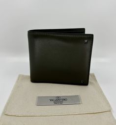 Valentino Grey Men's leather Wallet Designer Business Trifold Wallet, Modern Leather Wallets With Logo Plaque, Designer Bifold Wallet With Rfid Blocking, Designer Leather Trifold Wallet With Card Slots, Designer Trifold Wallet With Coin Pocket For Business, Classic Leather Wallet With Logo Plaque, Classic Leather Wallets With Logo Plaque, Designer Leather Bifold Wallet, Leather Wallets With Logo Plaque