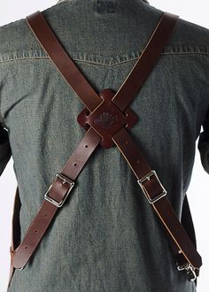 Description: Rugged, oil finished leather work apron that feels broken in right out of the gate. Features 3 hard-wearing, adjustable strap options made from the toughest bridle leather we could find. Color: Deep Tan - TobaccoHardware: NickelLength Options: 26", 28", 30", 32", 34", 36", 38", 40"More on sizing over here Strap options: X-Back: For an incredibly comfortable fit, choose the adjustable 1" harness-style straps with quick-release. Y-Back: Combines the comfort of the harness style straps Leather Shop Apron, Leather Working Projects Ideas, Leatherworking Ideas, Harness Style, Leather Working Projects, Apron Ideas, Spa Uniform, Work Apron, Shop Apron