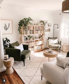 a living room filled with furniture and bookshelves