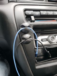 a car radio is plugged into the dash