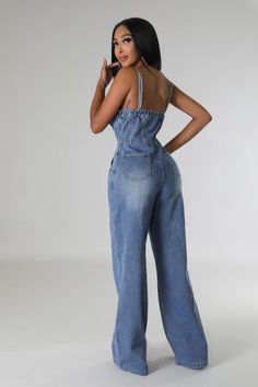 Wide leg, Non-stretch sleeveless denim jumper with sweetheart neckline. Jumpsuit has pockets and button closures. Jumpsuit runs small in the hips 75% cotton 30% polyester 5% spandex Hand wash cold Inseam is 36 inches Model is wearing a small Bell Bottom Jumpsuits, Denim Jumper, Denim Patterns, Denim Romper, Classy Casual, Maxi Dress Formal, Jumpsuit Fashion, Light Blue Denim, Sleeved Romper