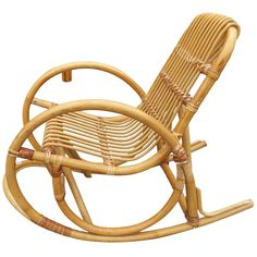 a wooden rocking chair made out of bamboo