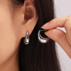 CRESCENT HOLLOW EARRINGS – MANDUORAN Trendy Hoop Earrings Made Of Alloy, Trendy Dangle Hoop Earrings In Alloy, Nickel-free Trendy Alloy Hoop Earrings, Minimalist Alloy Drop Earrings, Trendy Pierced Alloy Hoop Earrings, Trendy Silver Alloy Earrings, Trendy Pierced Hoop Earrings, Silver Chic Plug Earrings, Alloy Drop Hoop Earrings