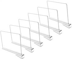 three metal shelves are lined up in the same direction, each with a single shelf between them