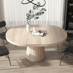 a round table with four chairs around it