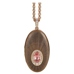 Victor Mayer oval locket pendant 18k rose gold, Peacock Collection, translucent light grey / pink tones vitreous enamel, 26 diamonds, total 0.26 ct, G VS, brilliant cut, 1 pink tourmaline, measurements app. 20.0 mm x 43.0 mm About the creator Victor Mayer Victor Mayer is internationally renowned for elegant timeless designs and unrivalled expertise in historic craftsmanship. Lovers of the extraordinary appreciate the beauty of Victor Mayer's designs, which use extremely rare techniques such as g Twisted Gold Ring, Rose Gold Lights, Enamel Locket, Gold Peacock, Vitreous Enamel, Oval Locket, Locket Pendant Necklace, Rose Gold Pink, Pink Enamel