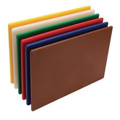 five different colored folders stacked on top of each other