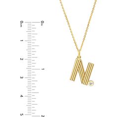 Unveil your inner radiance with the Block Lined Initial 'N' with Diamond Necklace by Olas d'Oro. This exquisite 12mm block initial pendant is a tribute to timeless design and craftsmanship. Crafted in 14K yellow gold, it exudes a retro-inspired charm that captivates the eye.The pendant, featuring a 1.7mm diamond bezel, adds a touch of luxury to your everyday style. The adjustable cable chain complements the pendant perfectly, allowing you to wear it at your preferred length. Whether worn solo or Yellow Gold Diamond Necklace With Initial Pendant, Luxury Yellow Gold Initial Necklace With Single Diamond, Yellow Gold Initial Pendant Necklace With Detachable Feature, Yellow Gold Diamond Initial Pendant Necklace, 14k Gold Diamond Cut Initial Pendant Jewelry, Diamond Birthstone, Initial Pendant, Bezel Diamond, Metal Necklaces