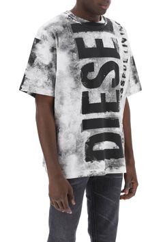 Diesel cotton jersey T-shirt featuring an oversized logo printed at front and back on a shaded background. It is cut for a loose fit and finished with a ribbed crew neck. The model is 187 cm tall and wears a size L. Composition: 100% CO | Diesel Men's Printed T-shirt With Oversized Logo in Very Black | SS24 Bleached Crew Neck Top For Streetwear, Faded Oversized Crew Neck Top, Oversized Faded Crew Neck Top, Casual T-shirt With Logo Lettering For Streetwear, Oversized Casual Logo T-shirt, Faded Crew Neck Top With Text Print, Oversized Cotton T-shirt With Logo Lettering, Acid Wash Casual Tops With Logo Print, Oversized Bleached Crew Neck Top