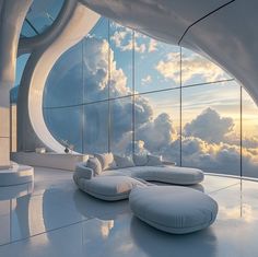 a living room filled with white furniture next to a large window covered in sky and clouds