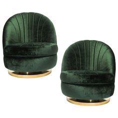 two green velvet chairs with gold bases