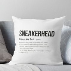 a pillow with the words sneakerhead on it in black and white throw pillow