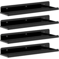 three black shelfs with metal brackets on them