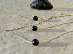 ** Need a Gift Idea? PeaceofStoneHandmade© Unique Jewelry is beautifully Eco- Consciously packaged- ready for gift giving to your someone special! Simple Black Tourmaline Necklace Small Crystal Ball, Protection Crystal Necklaces, Unique Jewelry Chic Vibrational Jewelry for Everyday Wear This necklace is versatile and intentional. Perfect for every occasion and everyday wear. Also, matches as a beautiful layering necklace. This Handmade Necklace is made with a natural rough-raw Black Tourmaline ( Onyx Bead Jewelry As Gift, Onyx Bead Jewelry Gift, Onyx Beads Jewelry Gift, Black Beaded Necklaces With Natural Stones For Gifts, Gift Onyx Beaded Necklaces, Round Onyx Beaded Necklaces For Gifts, Round Onyx Beaded Necklace As A Gift, Round Onyx Beaded Necklace For Gift, Onyx Beaded Necklaces With Round Beads For Gifts