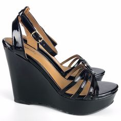 Avery Patent Pu Strappy Wedges Patent Pu Manmade Materials Strappy Ankle Buckle Closure Available Color: Black Approx. Heel Height: 4.75" (For Size 8) Approx. Platform Height: 1.5" (For Size 8) Imported Black Wedge Sandals For Summer Nights, Black Wedge Sandals For Summer Night Out, Trendy Black Wedge Sandals For Night Out, Black Synthetic Wedge Sandals For Day Out, Chic Black Wedge Sandals For Day Out, Black Wedge Sandals For Spring Night Out, Black Wedge Sandals For Night Out In Spring, Strappy Wedges, Womens Shoes Wedges