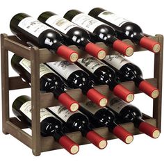 3-Tier Moca Bamboo Wine Rack is crafted from 100% natural bamboo, offering a stylish and eco-friendly solution for storing up to 36 bottles of wine. Its compact design saves space while adding elegance to any setting. Millwood Pines | Millwood Pines 3-Tier Moca Bamboo Wine Rack - Holds 36 Bottles, Space-Saving & Elegant Design in Brown | 11.81" H X 15.79" W X 9.21" D | Wayfair Wine Storage Cabinet, Wine Storage Cabinets, Cabinet Shelf, Storage Cabinet Shelves, Wine Storage, Lighting Sale, Game Room Furniture, Outdoor Shade, Bar Furniture