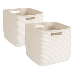 two white storage baskets with handles