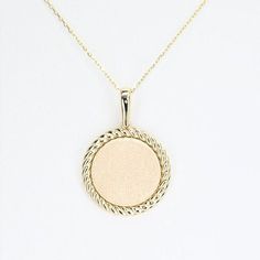 14k Solid Gold Engravable Disc Charm, Real Gold Premium Disc Pendant, Round Charm Necklace For Her. All of the materials including pendant and chain are 14k Solid Gold.  Dimensions - Chain width: 1.20 mm.  Pendant Width: 19.7 mm.  Pendant Height: 28.0 mm. 💙 Our jewelry is handcrafted with love and great care at San Francisco Bay! All of our items are 14k stamped for authenticity. 💙 You will receive them exactly as pictured. We don't use any filters, all photos are authentic and unedited. 💙 The material is 14k solid gold and should not be confused with gold plating or filling. It won't tarnish or fade over time. 💙 Our chain is a special diamond cut chain with 1.20 mm thickness. It's dainty and sturdy. We're offering the finest quality in solid gold jewelry. 💙 Quick shipping - Your orde 14k Gold Tarnish Resistant Chain Necklace With Round Pendant, Tarnish Resistant 14k Gold Chain Necklace With Round Pendant, 14k Rose Gold Chain Necklace With Round Pendant, 14k Gold Tarnish Resistant Pendant Charm Necklaces, Tarnish Resistant 14k Gold Pendant Charm Necklaces, 14k Gold Tarnish Resistant Pendant Charm Necklace, Recycled Gold Medallion Coin Pendant, 14k Gold Pendant Medallion Necklace, 14k Gold Pendant Necklace, Tarnish Resistant